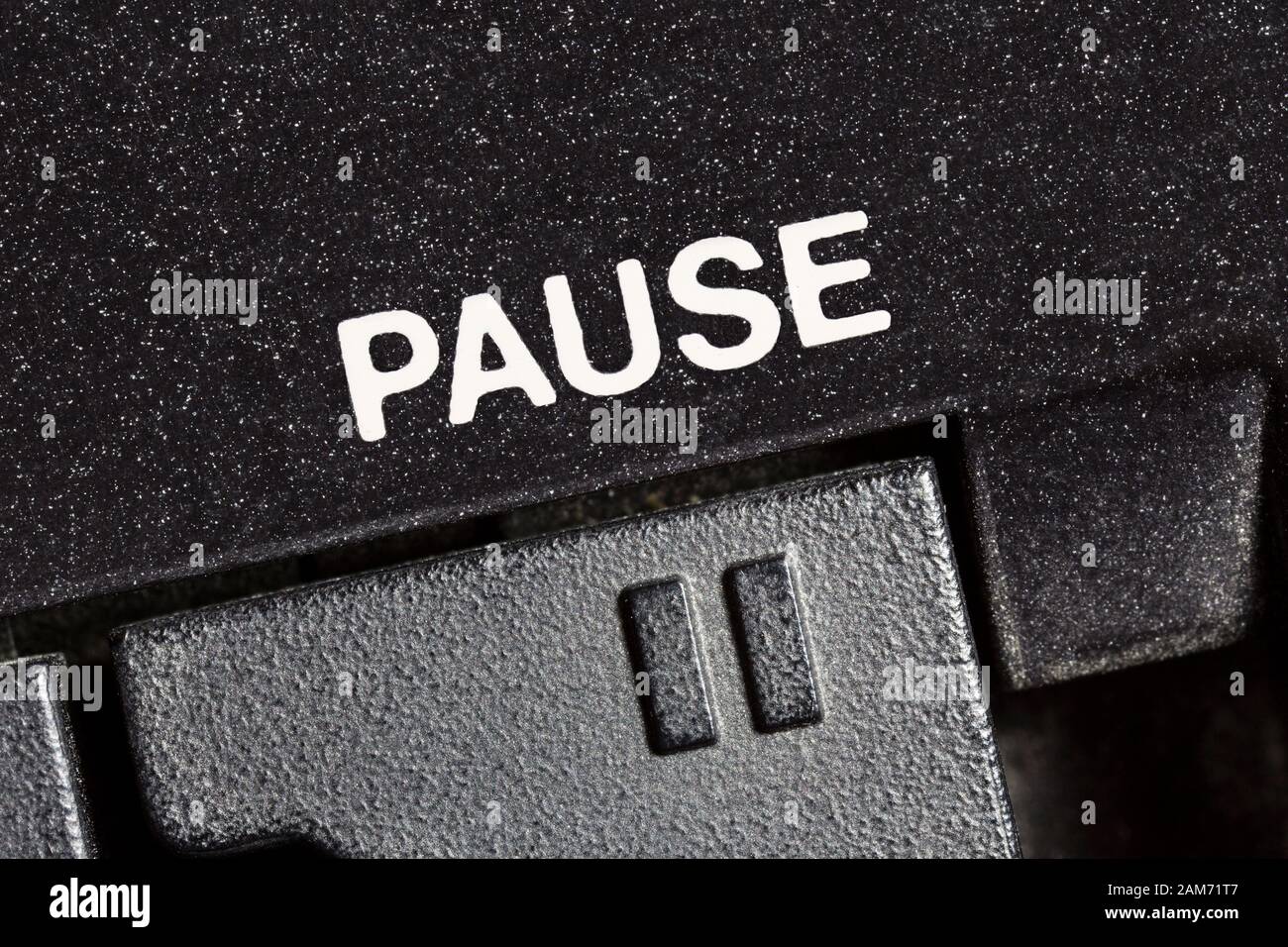 Macro close up photograph of vintage tape machine play and record pause button. Stock Photo