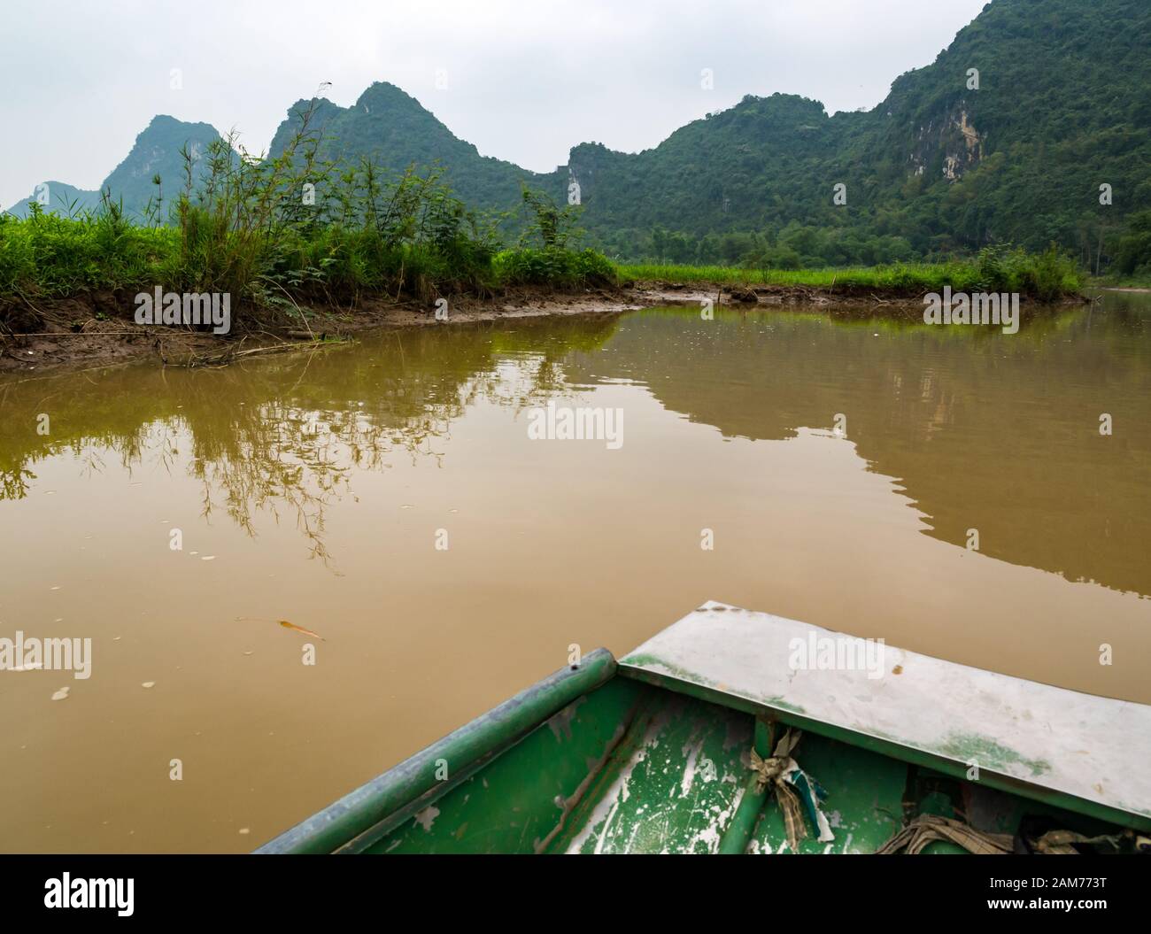 Sampan on river, Tam Coc cave system, Ninh Binh, Vietnam, Asia Stock Photo