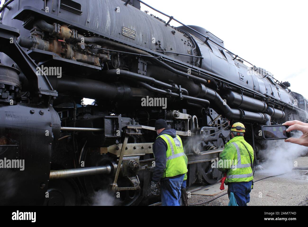 Big Boy 4014 in Ellsworth Kansas USA with Steam and Smoke on a Historical Day on 11-21-2019 that was on an overcast day. Stock Photo