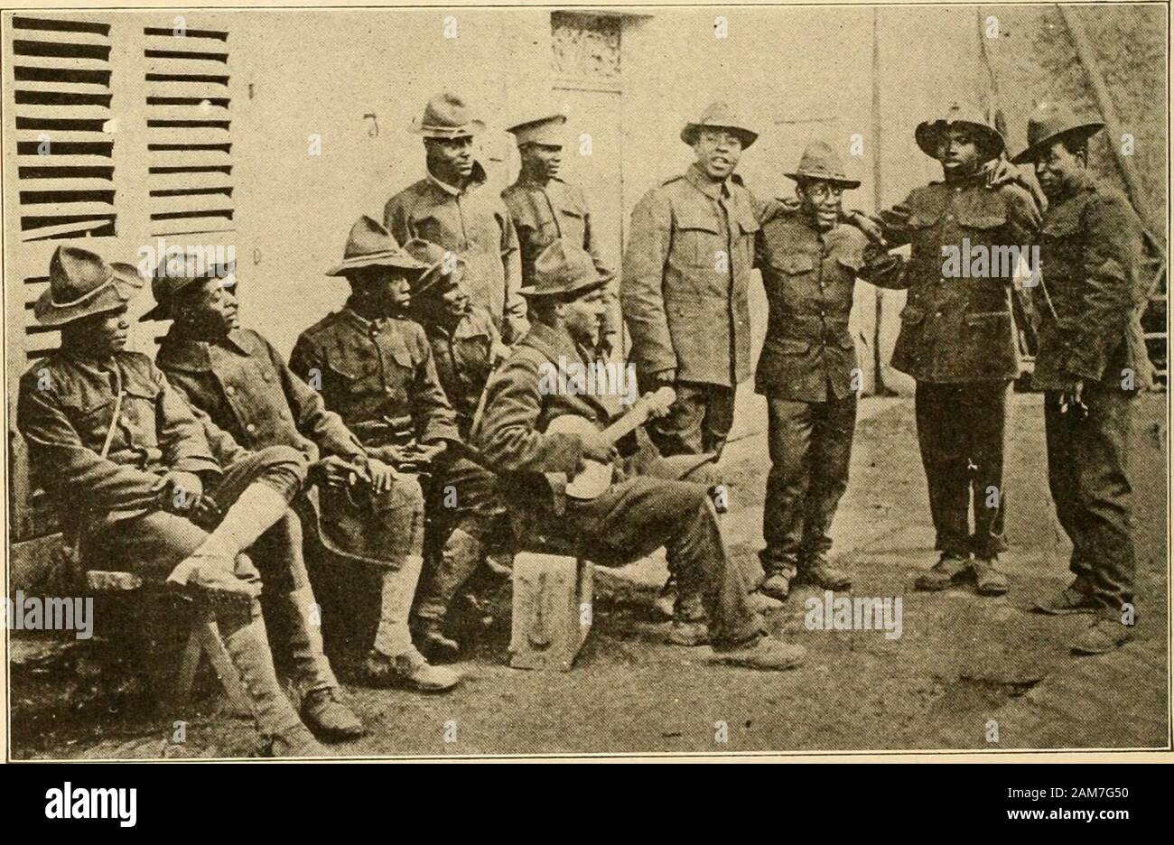 The people's war book; history, cyclopaedia and chronology of the great  world war . Colored troops on guard in France.. little recreation for  colored soldiers attached to the 23rd Engineers Regiment. AMERICAS