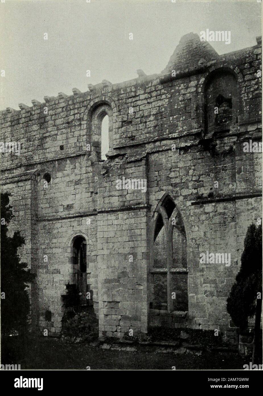 Sixth report and inventory of monuments and constructions in the county of Berwick . the vault clearly dates from the end of the 16th century. The sillsof the windows are at a considerable height above the floor level,the plain wall-space below the east windows being ornamented witha wall arcade of semicircular intersecting arches of Norman form,springing from circular moulded caps supported on single detachedshafts with moulded bases which rest upon a continuous stone benchraised about 1 foot 6 inches above the floor level. Indications ofcoloured decoration occur in several places within the Stock Photo