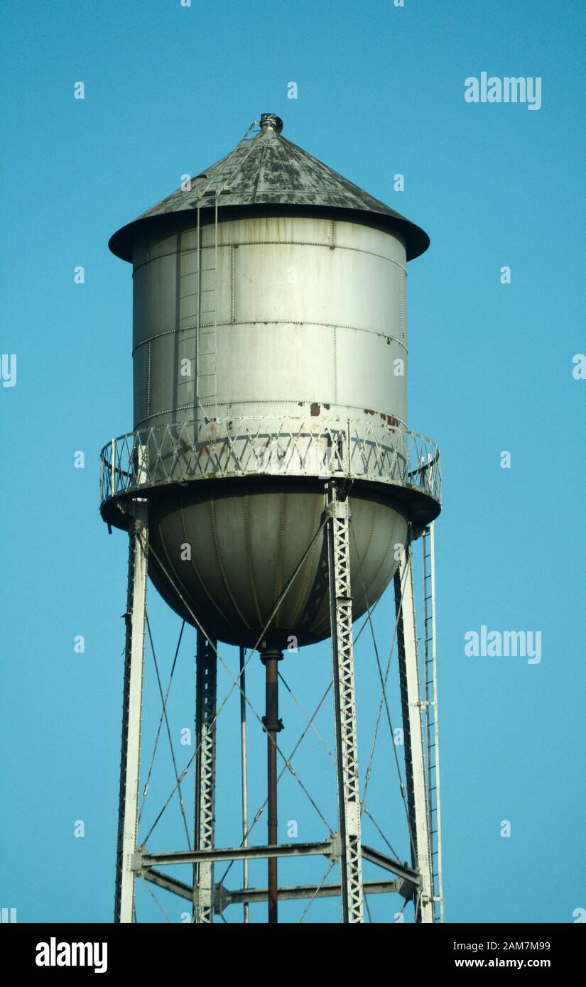 A metal water tank on top of a building in downtown Denver, Colorado USA Stock Photo