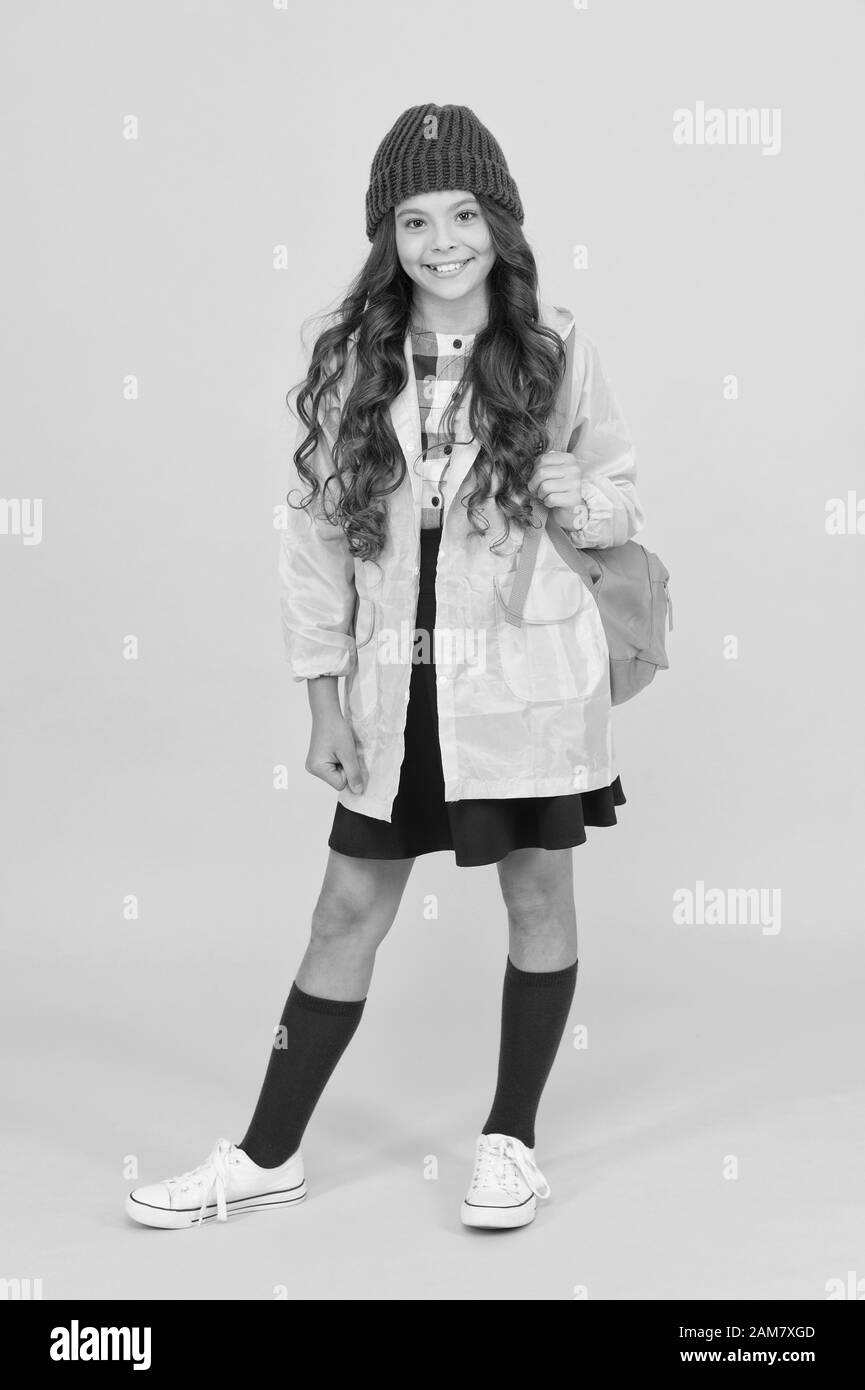 School and non-school lesson. Little child with autumn look skip lesson ...