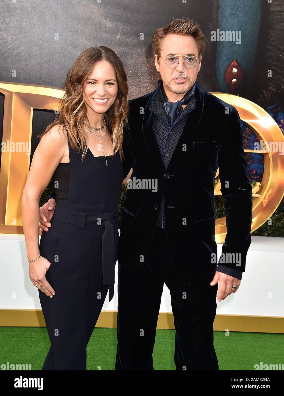 WESTWOOD, CA JANUARY 11 Robert Downey Jr. (R) and Susan Downey