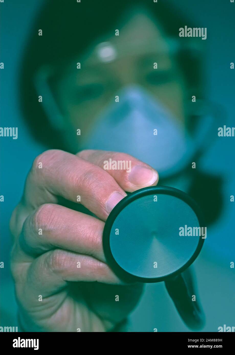 a lady doctor holding a stethescope Stock Photo