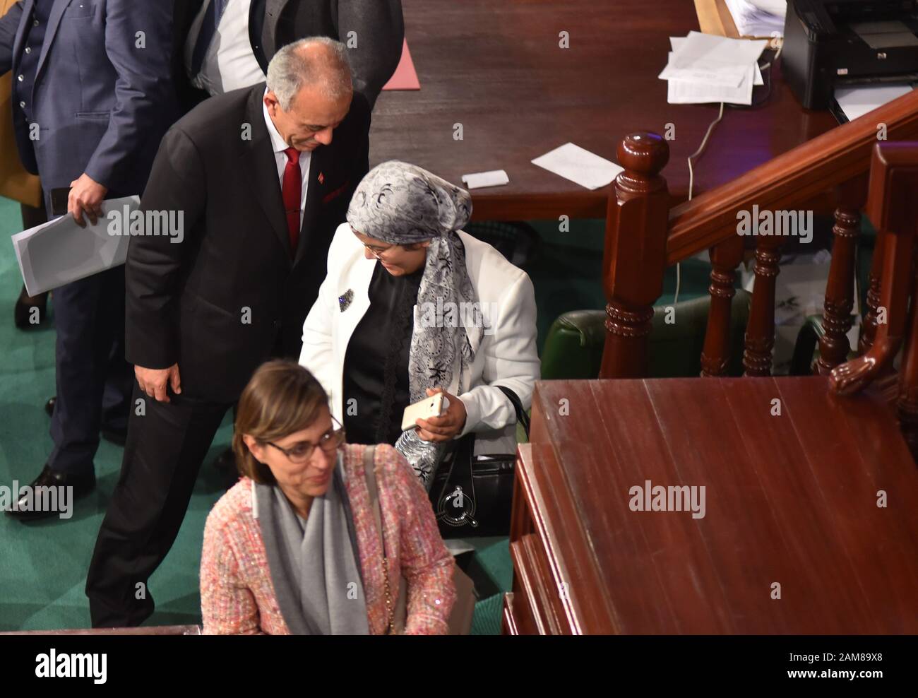 Tunisian parliament speaker Rachid al-Ghannouchi walks to the podium to where he announced that the government of Jemli fell after a no-confidence vote in parliament.The government managed with 72 votes with just 134 deputies against, Parliament Speaker Rachid Ghannouchi announced after the session that lasted more than 10 hours. Stock Photo