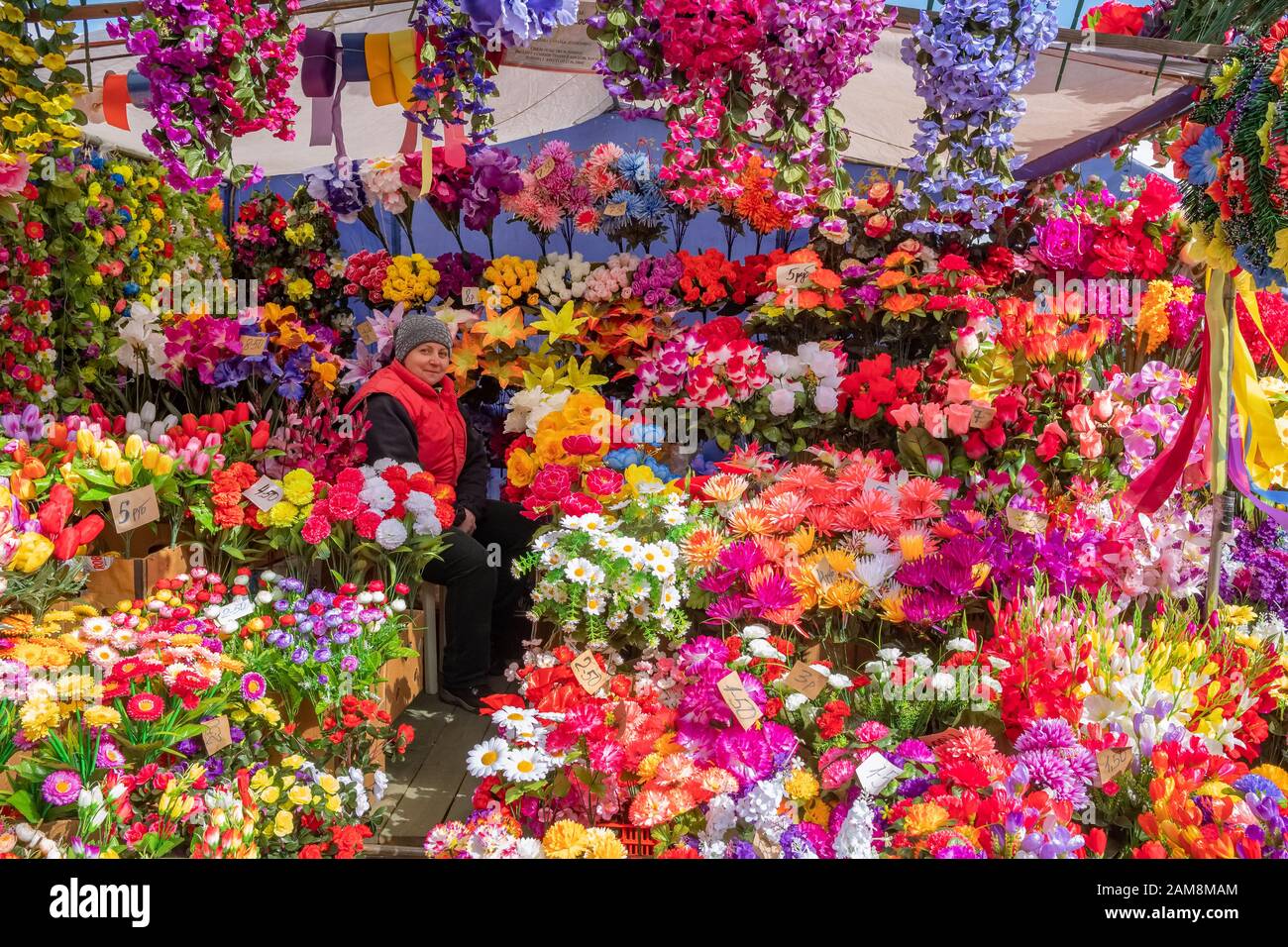 Artificial plastic flowers for sale on the eve of Orthodox holiday of