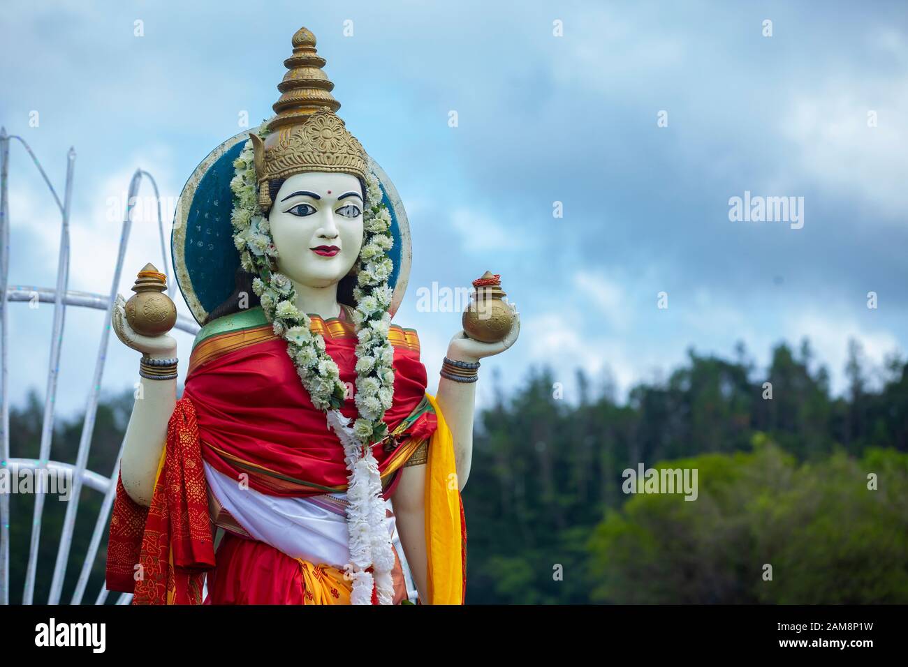 Statue of Hindu Goddess Laxmi at sacred lake of Grand Bassin, Mauritius Stock Photo