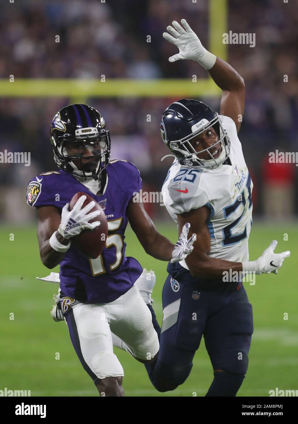 Baltimore Ravens wide receiver Marquise Brown (15) hauls in a long pass to  set up a field goal at the end of the first half during the AFC divisional  playoff against the
