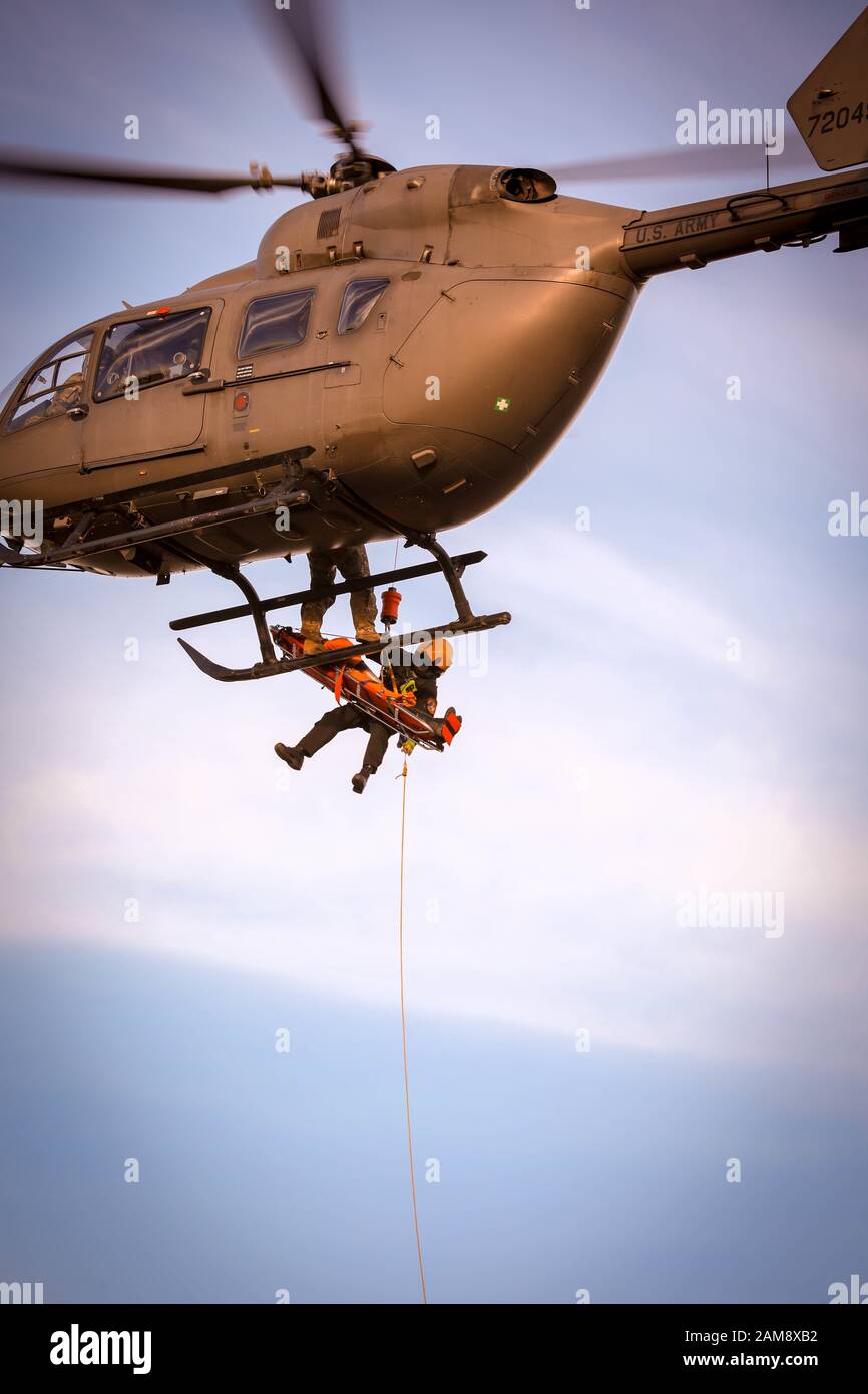North Carolina Helicopter Aquatic Rescue Team (NCHART) aircrew lower a