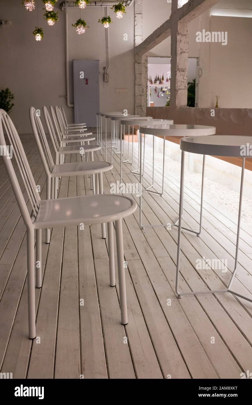 Interior Decoration White Chairs And Circle Desks Lamps Are