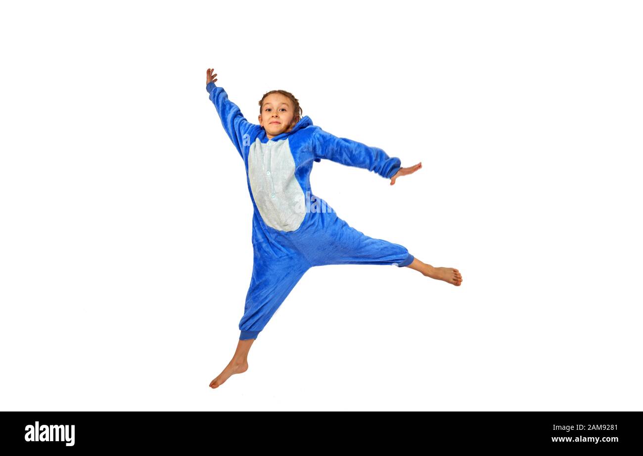 cheerful little girl in pajamas on a white background Stock Photo - Alamy