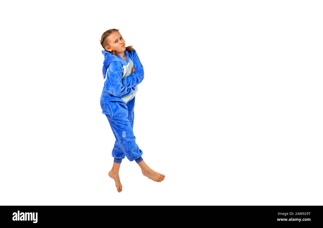 cheerful little girl in pajamas on a white background Stock Photo - Alamy