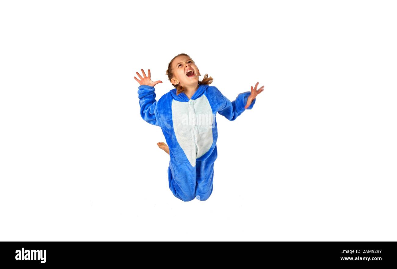 cheerful little girl in pajamas on a white background Stock Photo - Alamy