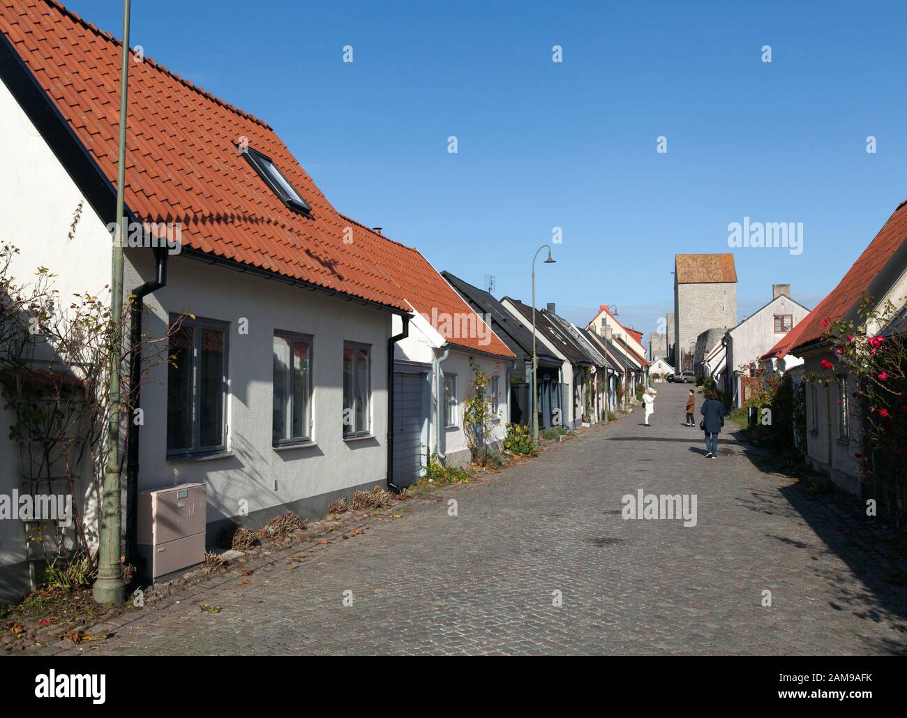 VISBY, SWEDEN ON OCTOBER 12, 2019. Street view of buildings. Old house, homes in the town. Unidentified folk. Editorial use. Stock Photo