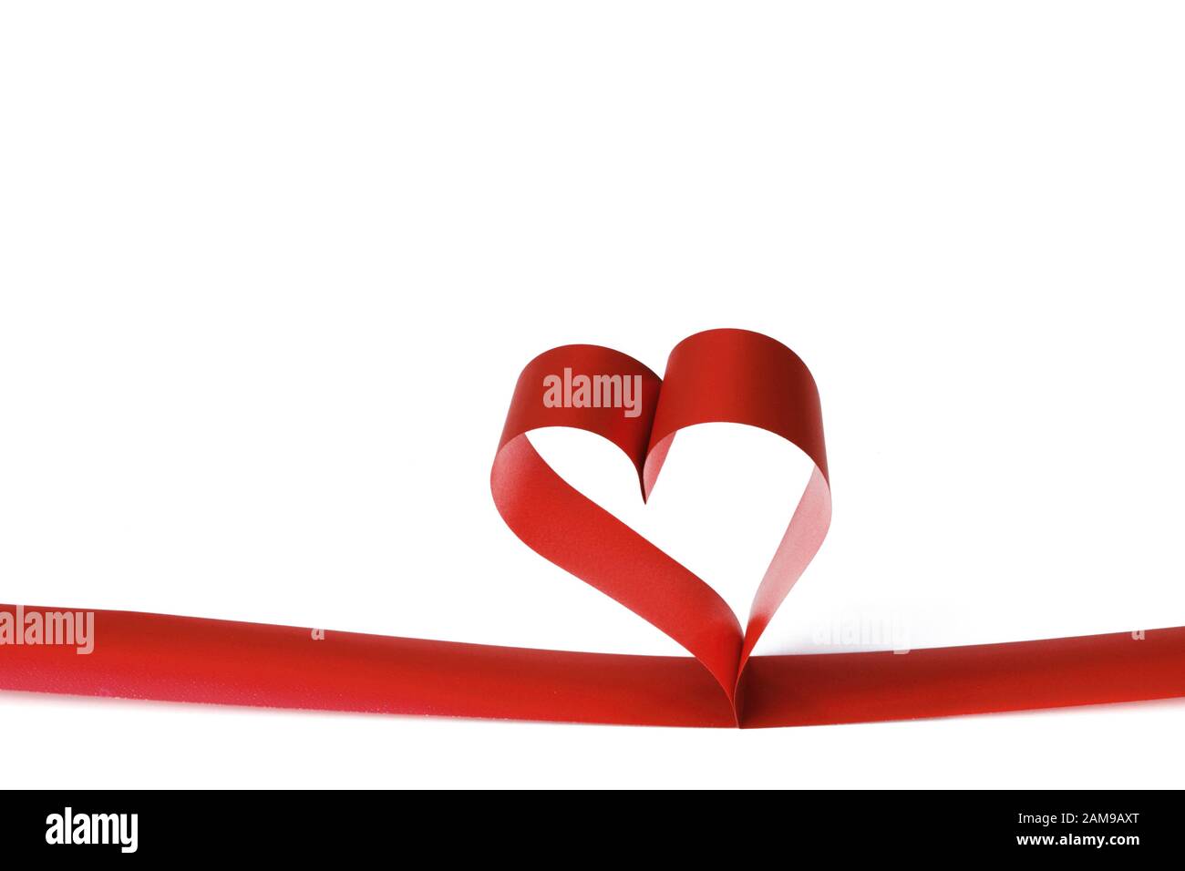 Heart shaped red ribbon isolated on white background Stock Photo - Alamy