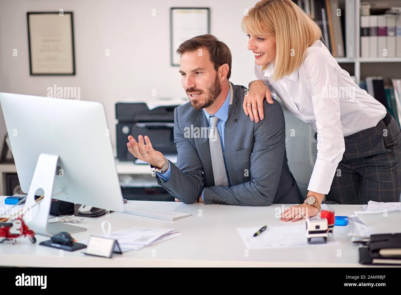 business woman and business man at office working together Stock Photo ...