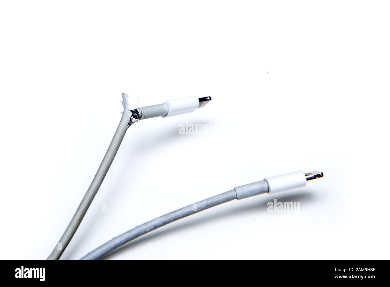 The broken and frayed cable from the charger for the smart phones