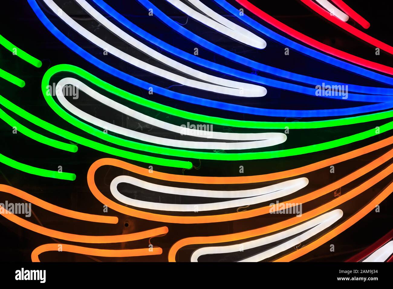 Colorful fluorescent light neon on black background Stock Photo