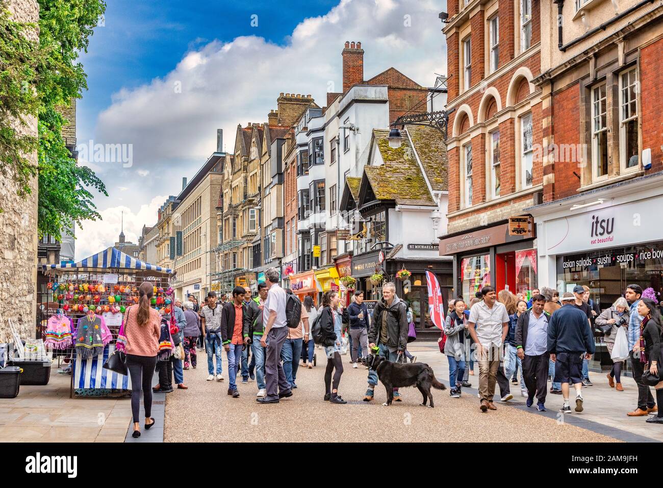 6 June 2019: Oxford, UK - Cornmarket Street, crowds sightseeing and shopping in one of Oxford's main shopping areas. Stock Photo