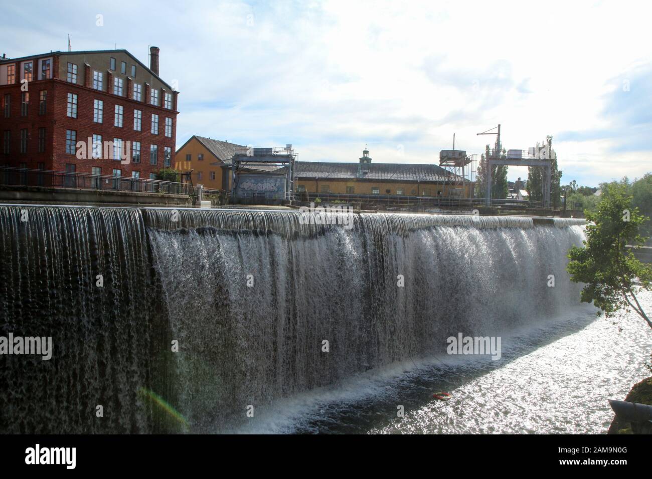 The Industrial center of the city of Norrköping in Sweden. The nice Industrial buildings with typical nordic design surrounded by water. Stock Photo