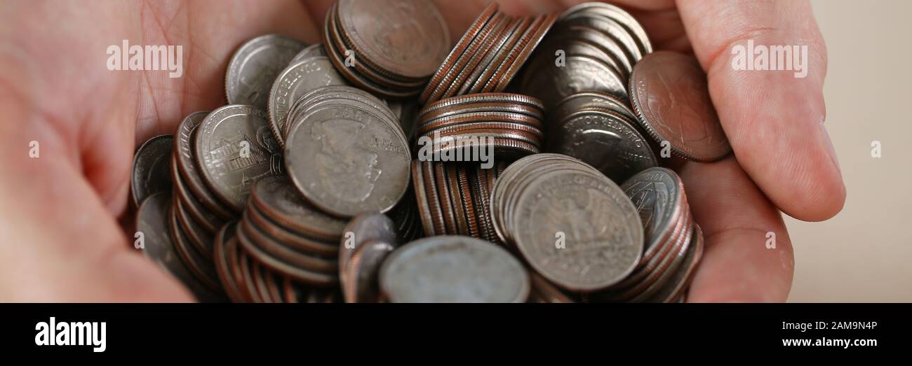 Hand businessman putting pin money Stock Photo Alamy