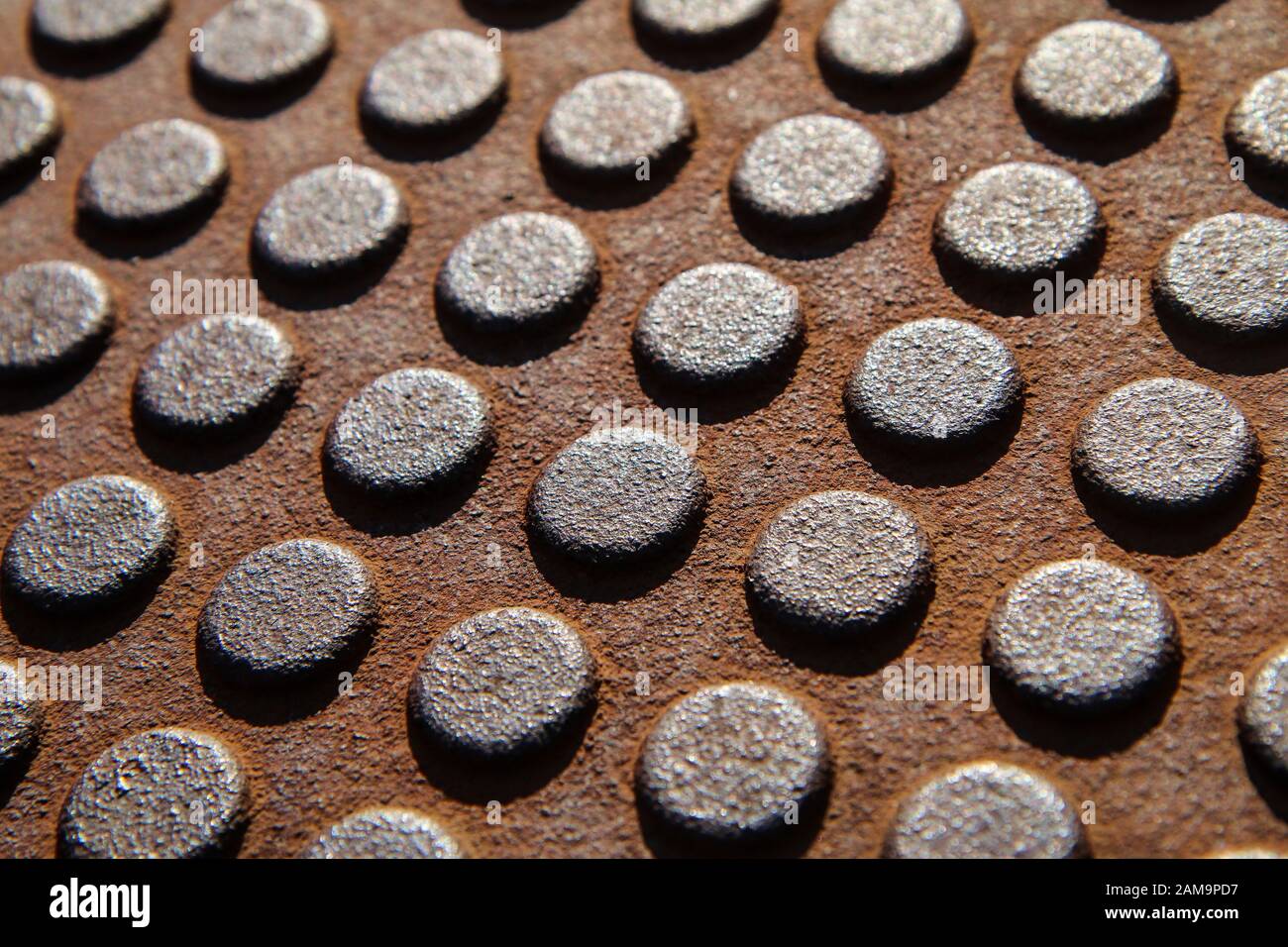 A detail of the many rivets on an industrial construction. Or of a ...