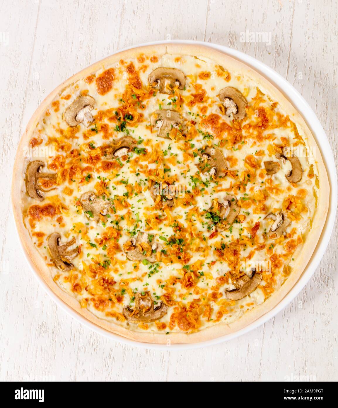Pizza with mushrooms and cheese Stock Photo - Alamy