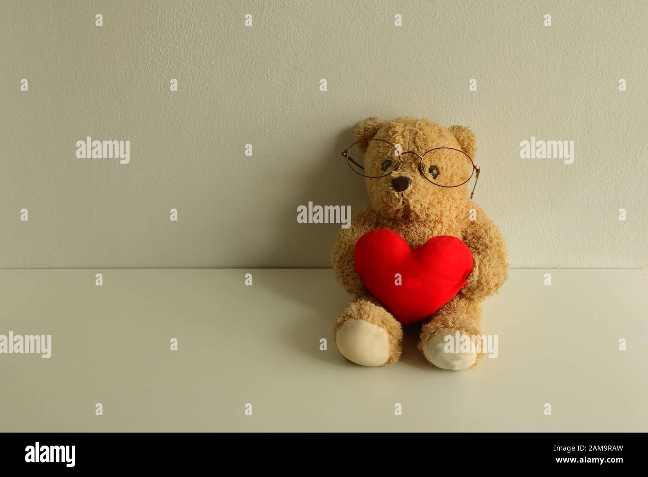 Cuddly white teddy bear red hi-res stock photography and images - Alamy