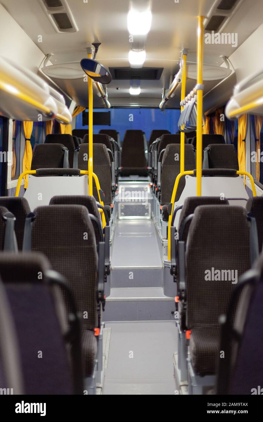 Empty passenger compartment of a bus Stock Photo