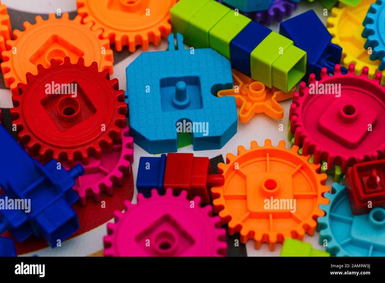 Plastic parts designer. The mechanism of plastic blocks. Colorful ...