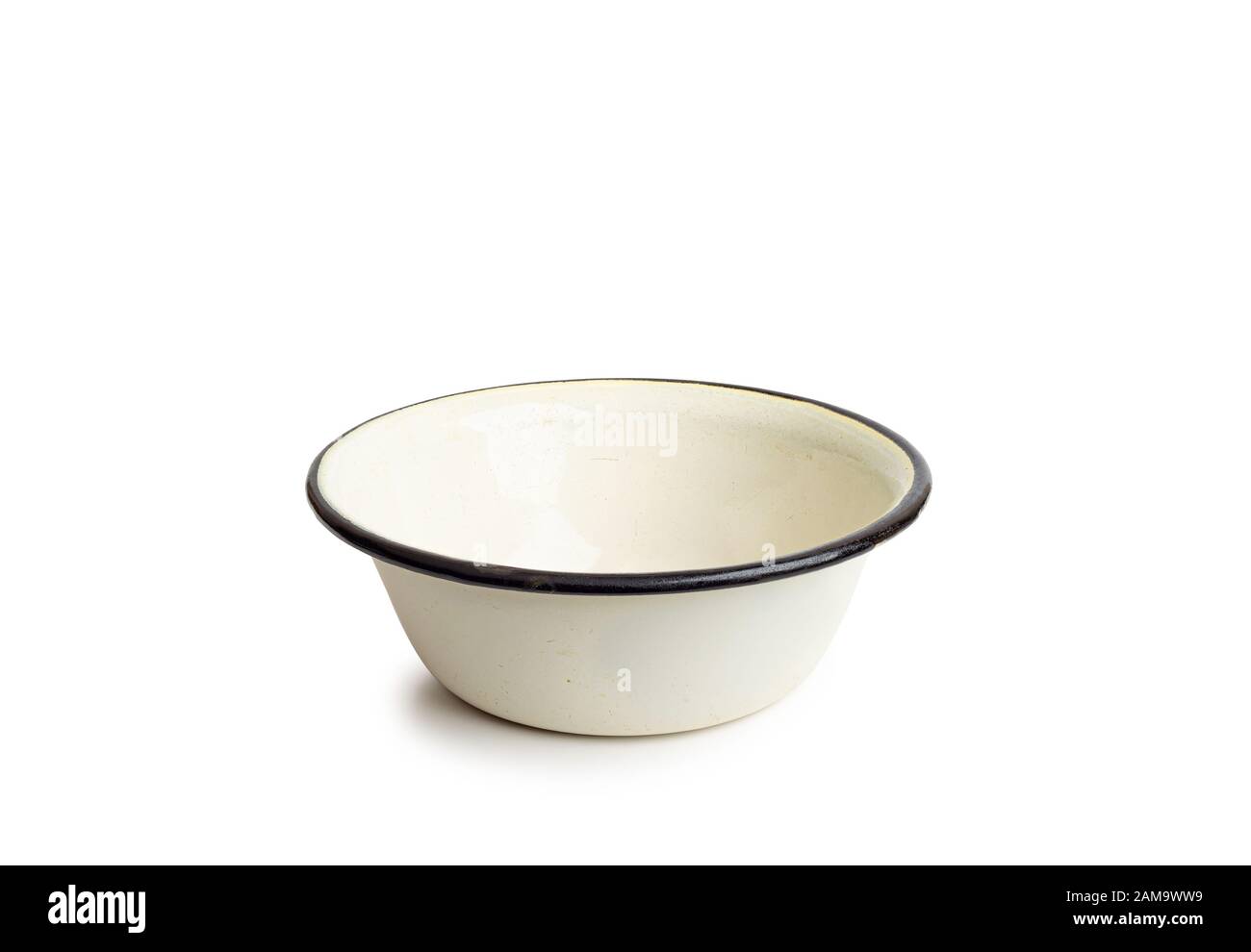 Old enamel dishe, or bowl, isolated on white background Stock Photo