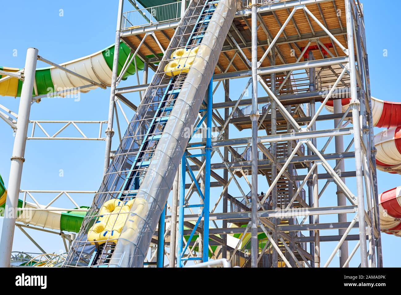 High slides in water park. Aqua park background Stock Photo - Alamy
