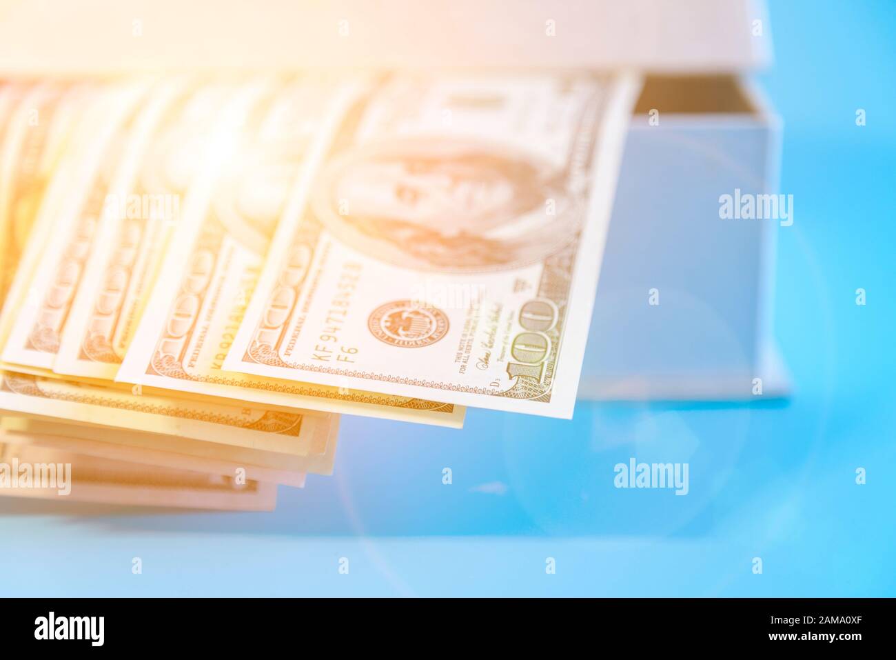 Dollar In Box Dollars in safe deposit box hi-res stock photography and images - Alamy