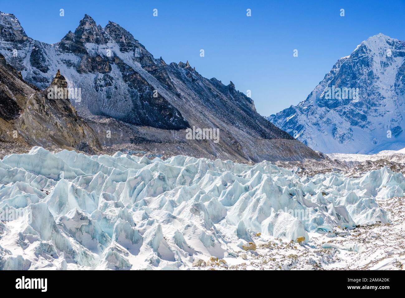 Seracs on The Khumbu Glacier in the Nepal Himalayas, often visited as part of the Everest Base Camp Trek Stock Photo