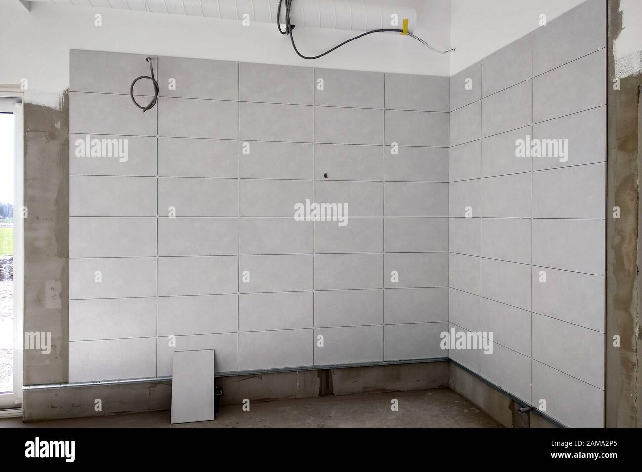 Wall ceramic tiles installation on mortar glue Stock Photo Alamy