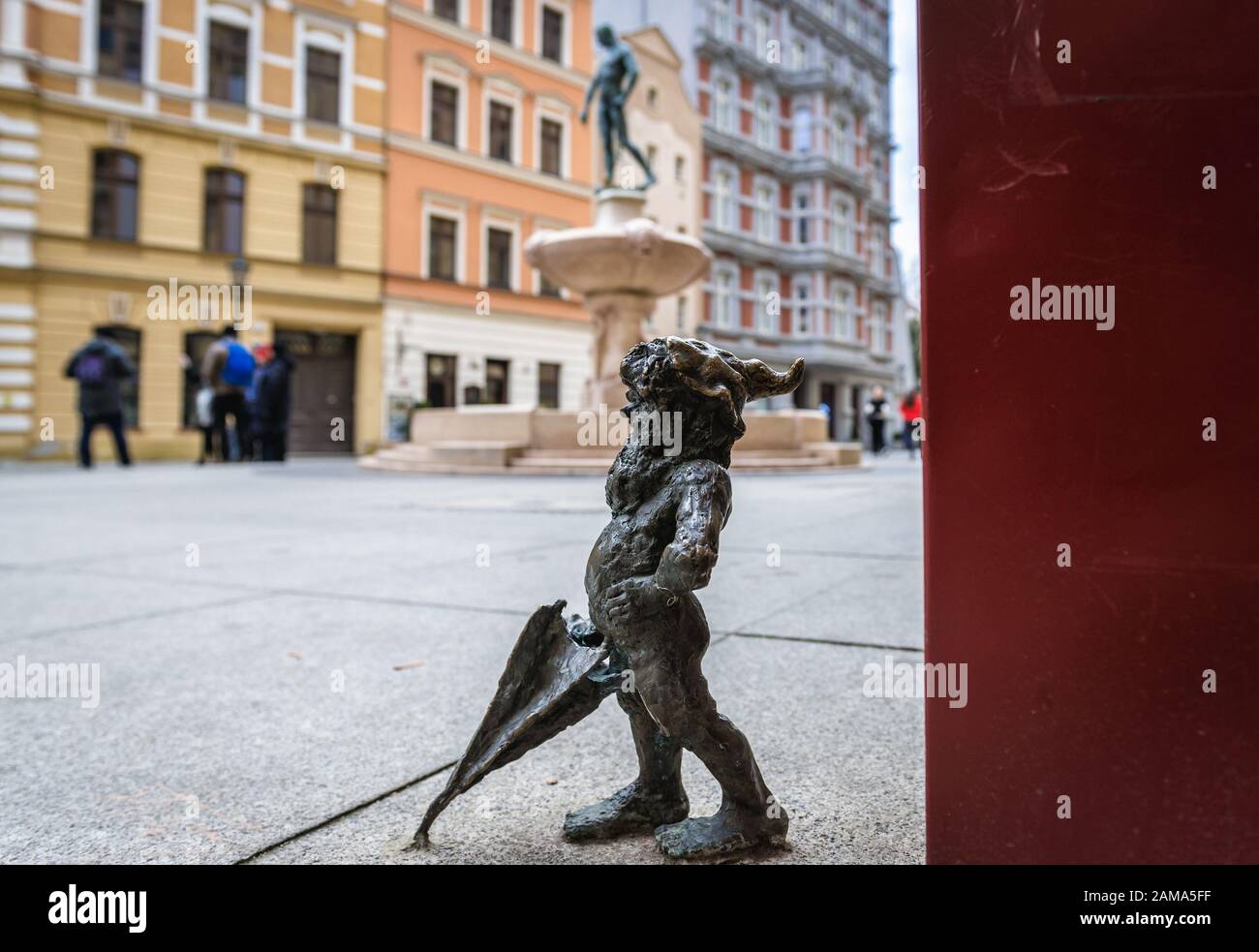 Figurine of dwarf called Szermierz in front of Swordsman Fountain 