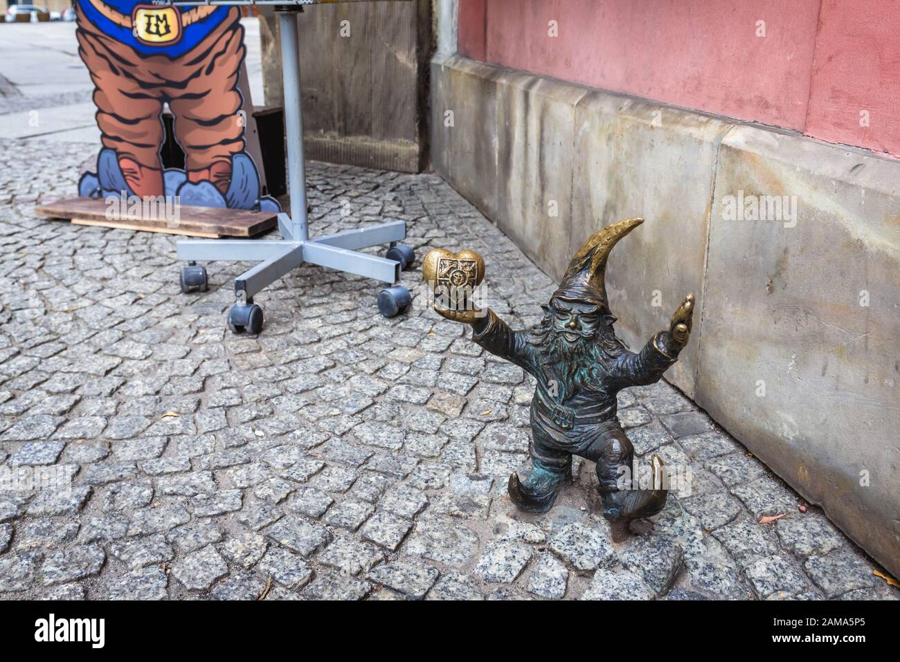 Figurine of dwarf called WrocLovek on the Old Town Market Square 
