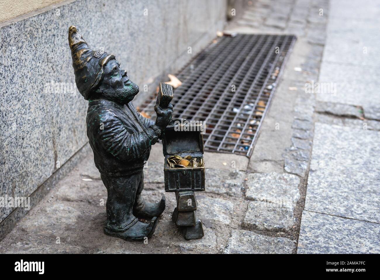 Figurine of dwarf called Lombardzik (small pawnshop) on Krupnicza 