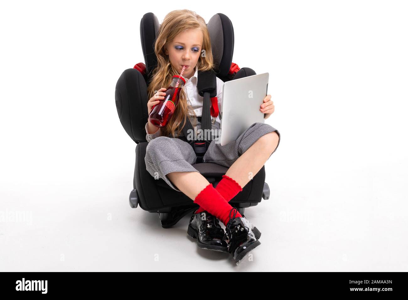 A little girl with makeup and long blonde hair sits on a car baby chair and looks film or cartoon Stock Photo - Alamy A little girl with makeup and long blonde hair sits on a car baby chair and looks film or cartoon Stock Photo - Alamy