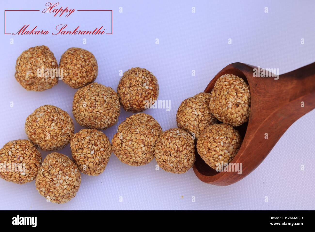 Til Gul OR Sweet Sesame Laddu for Indian festival Makar Sankranti over white background Stock Photo