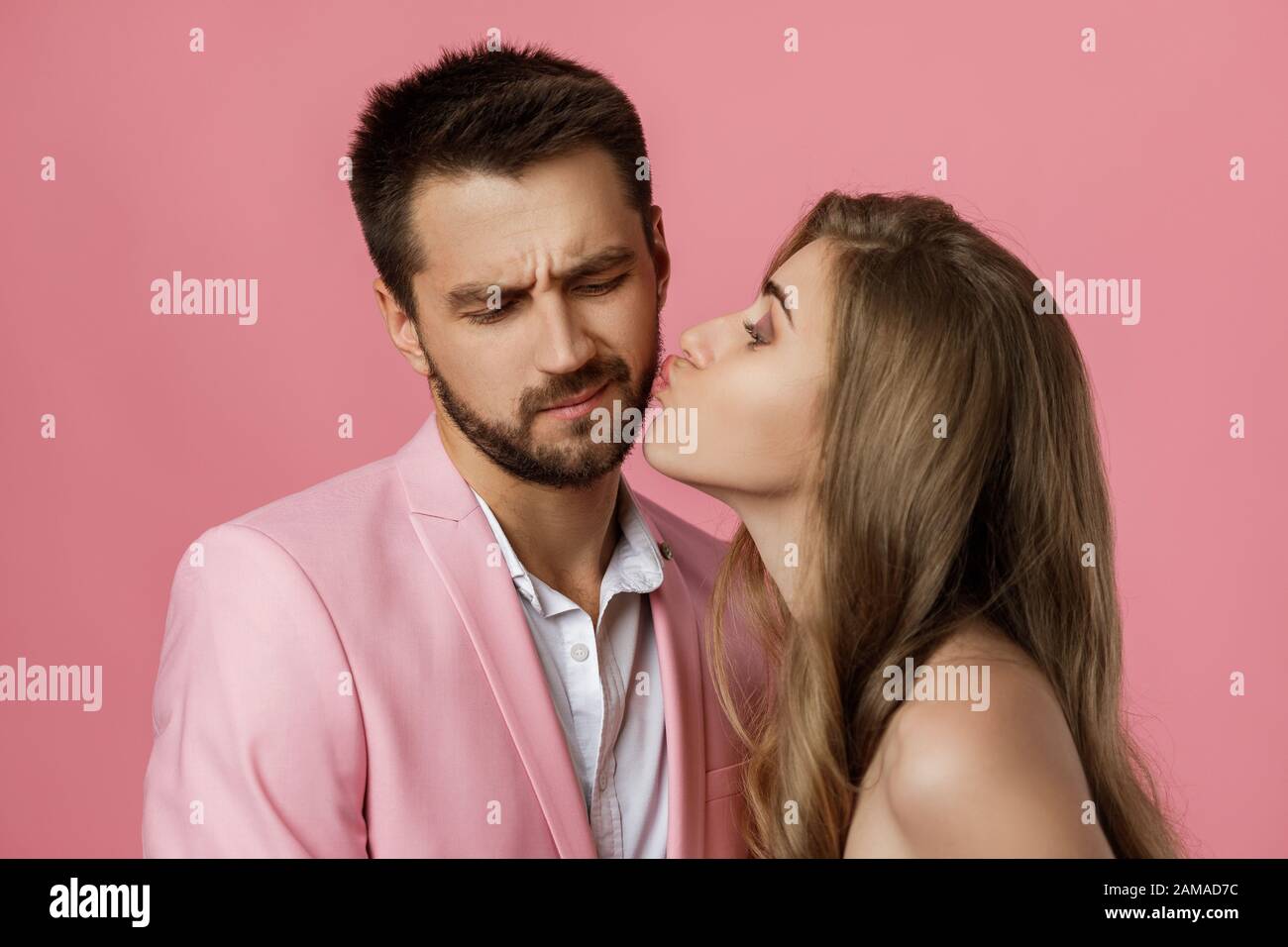 woman kissing her boyfriend. close-up. st valentines day. funny happy couple in love on pink background Stock Photo - Alamy woman kissing her boyfriend. close-up. st valentines day. funny happy couple in love on pink background Stock Photo - Alamy