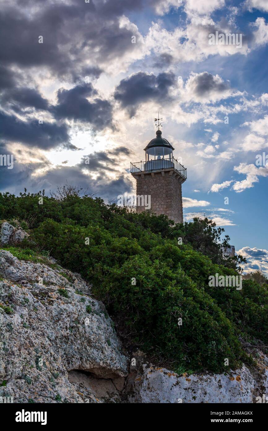 Cape Melagkavi Lighthouse also known as Cape Ireon Light on a headland  overlooking eastern Gulf of Corinth, Greece Stock Photo - Alamy