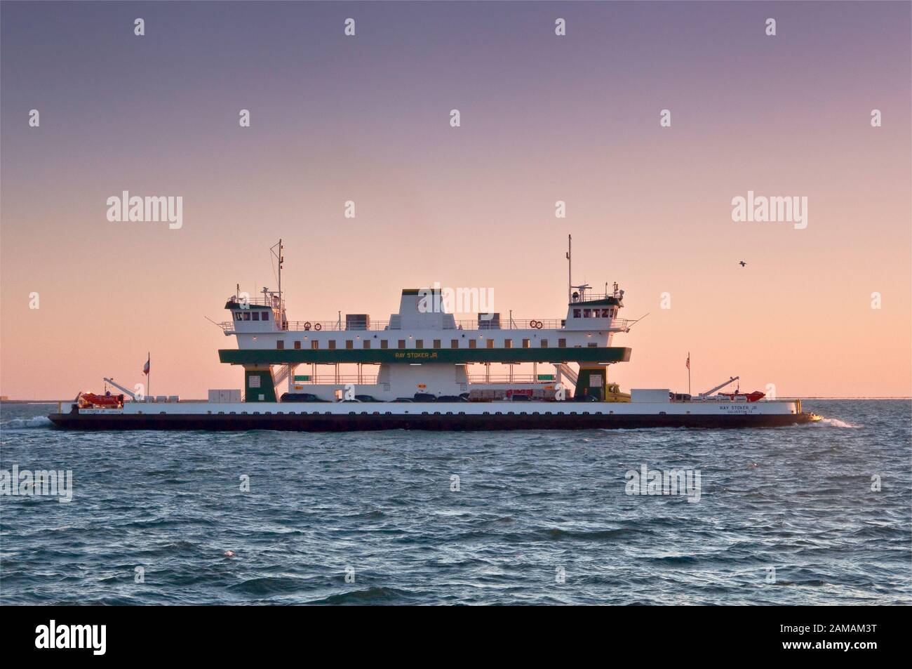 Ray Stoker Jr, ferry crossing Galveston Bay, at dawn, near Bolivar Peninsula, Texas, USA Stock Photo