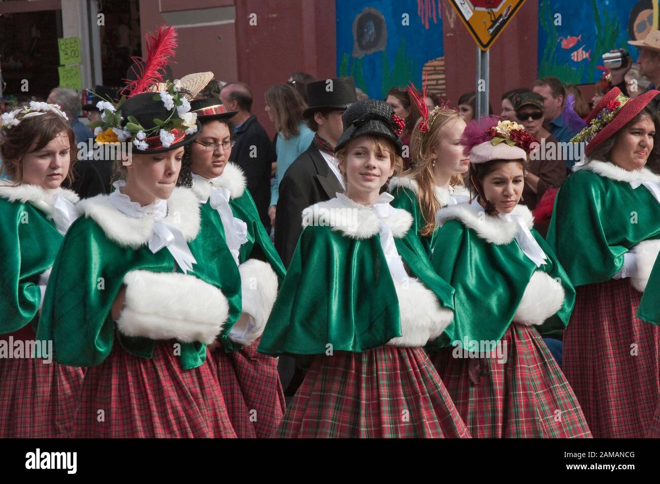 Carolers in Victorian period costumes at Dickens on The Strand parade ...