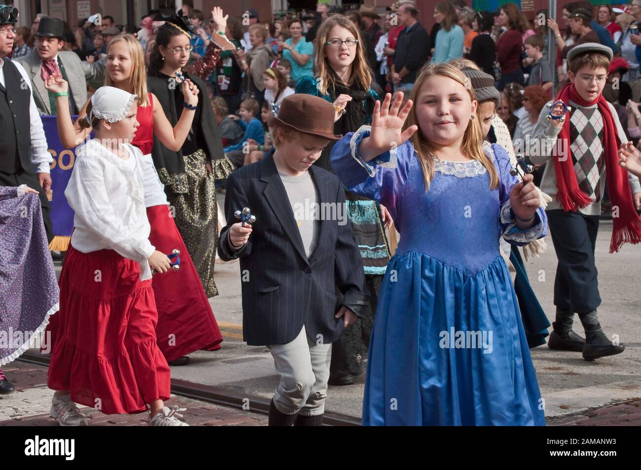 Children in period costumes at Dickens on The Strand parade, The Strand, Galveston, Texas, USA Stock Photo