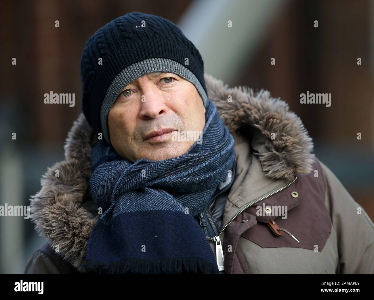 England head coach Eddie Jones watching Northampton Saints and Benetton Rugby during the Heineken Champions Cup pool one match at Franklin's Gardens, Northampton. Stock Photo