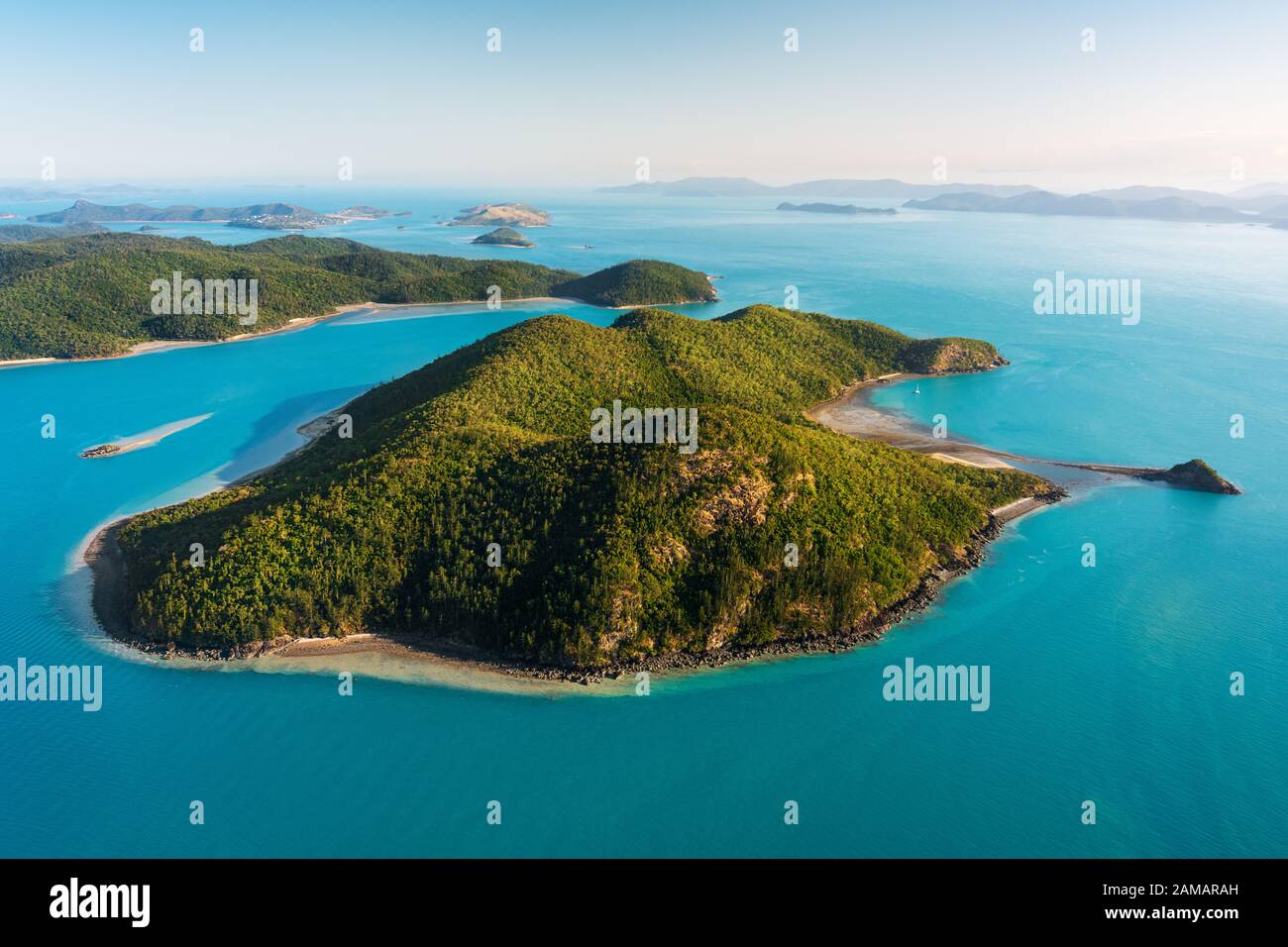 Aerial shot of Cid Island, part of the famous Whitsunday Islands. Stock Photo