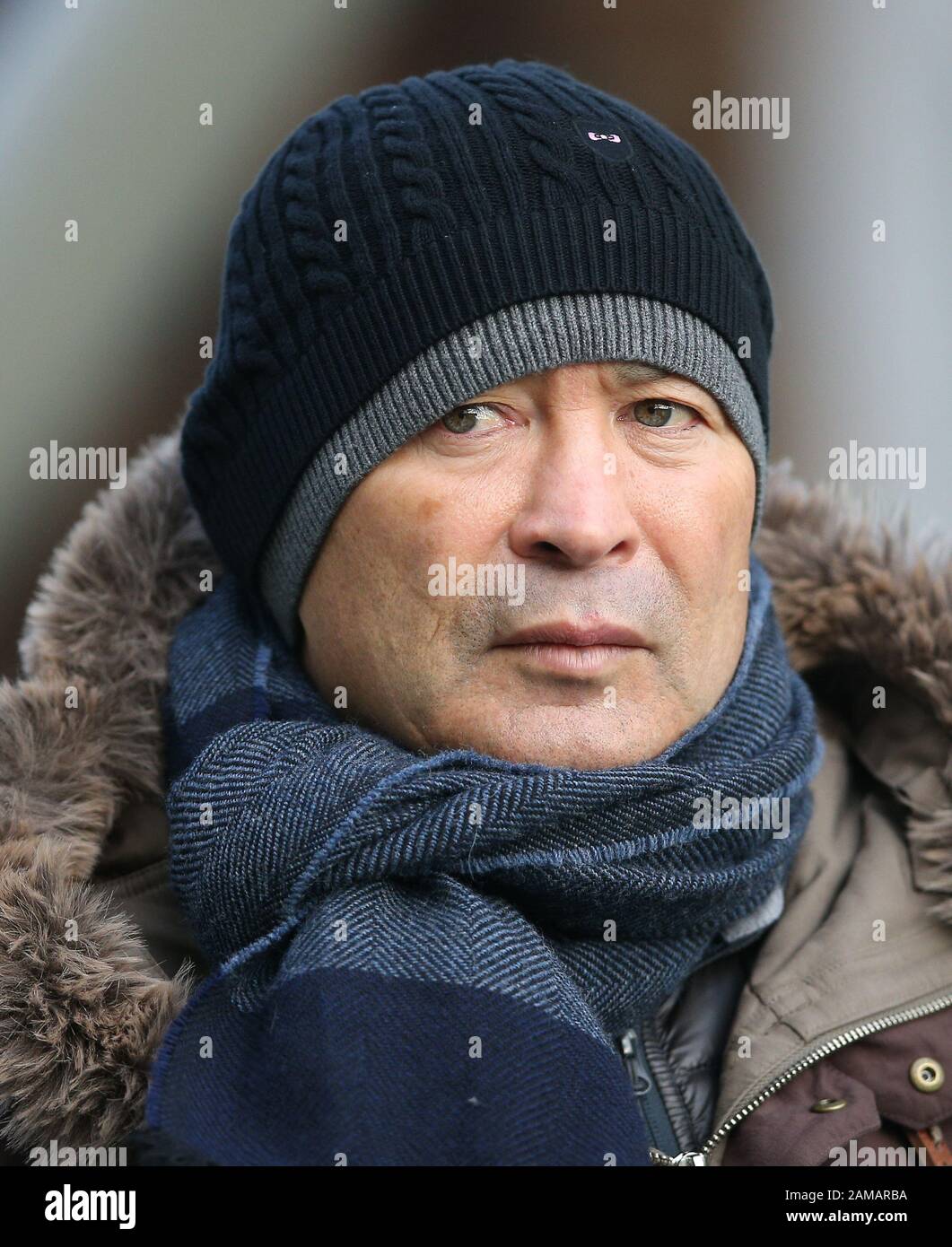 England head coach Eddie Jones watching Northampton Saints and Benetton Rugby during the Heineken Champions Cup pool one match at Franklin's Gardens, Northampton. Stock Photo