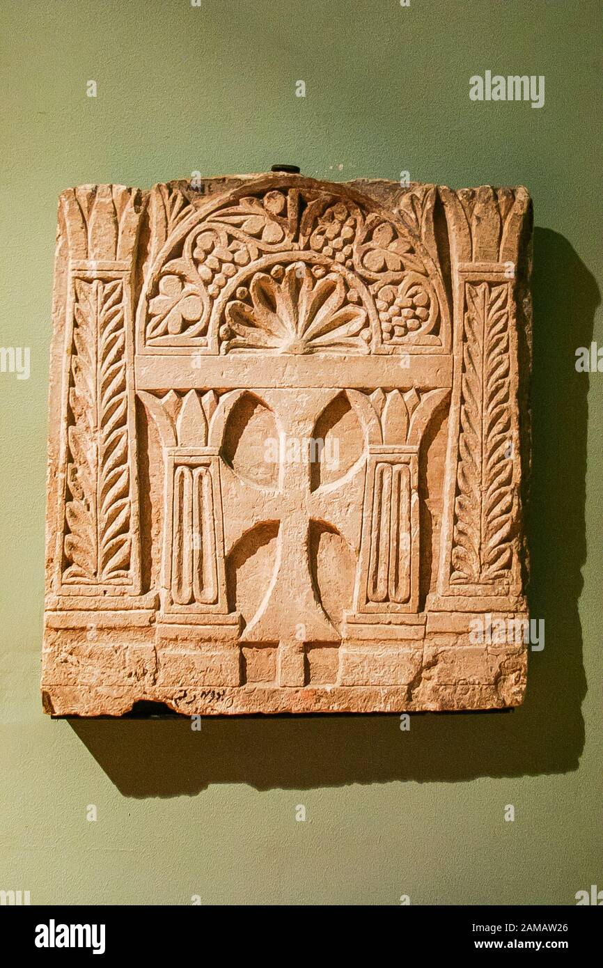 Egypt, Alexandria, National Museum, Coptic art, limestone decorated with fruit, shell and cross. Stock Photo